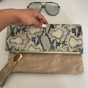 Lulu’s snakeskin faux leather clutch